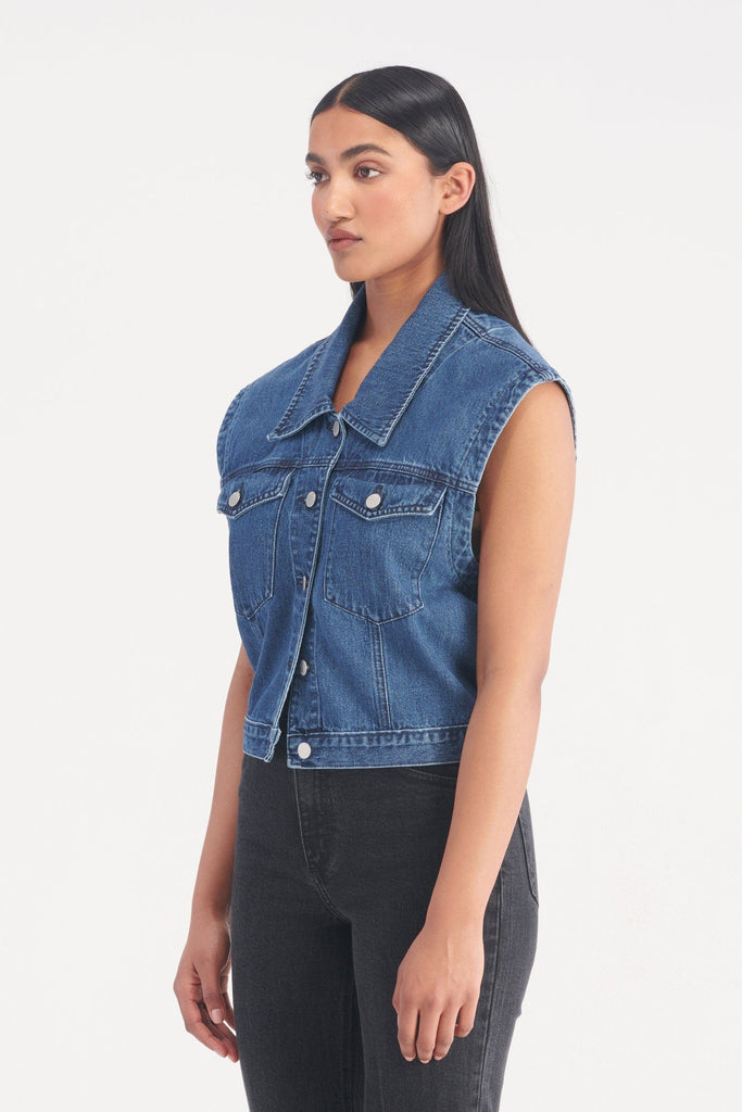 Green denim store vest